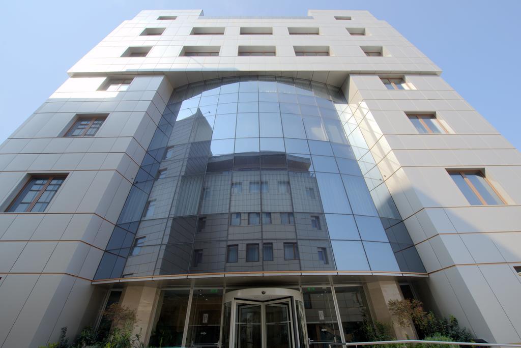 Premier Palace Spa Hotel Boekarest Buitenkant foto The headquarters of the National Bank of Egypt